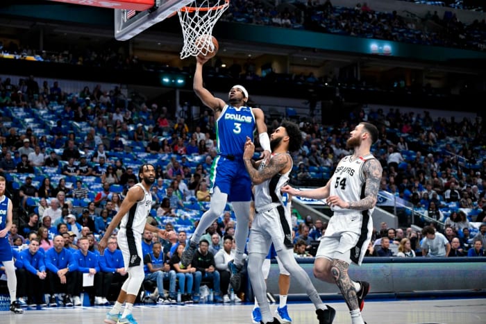 Dallas Mavericks’ Jaden Hardy drives in for a layup against the San Antonio Spurs.